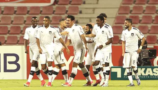 Al Saddu2019s  Baghdad Bounedjah is congratulated by his teammates after his goal against Al Arabi yesterday.
