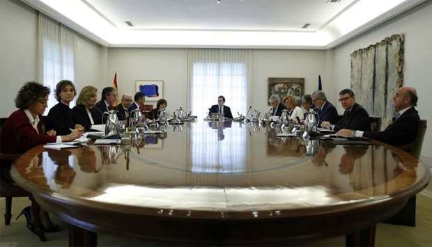 Spain's Prime Minister Mariano Rajoy heads a special cabinet meeting at the Moncloa Palace in Madrid