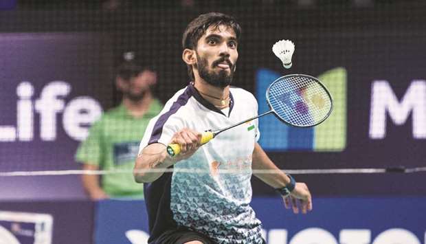 Kidambi Srikanth of India hits a return against Wong Wing Ki Vincent of Hong Kong during their Denmark Open semi-final yesterday. (Reuters)
