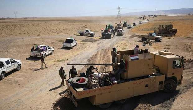 Iraqi forces and the Hashed al-Shaabi (Popular Mobilisation units) advance towards the Islamic State (IS) group's stronghold of Hawija.