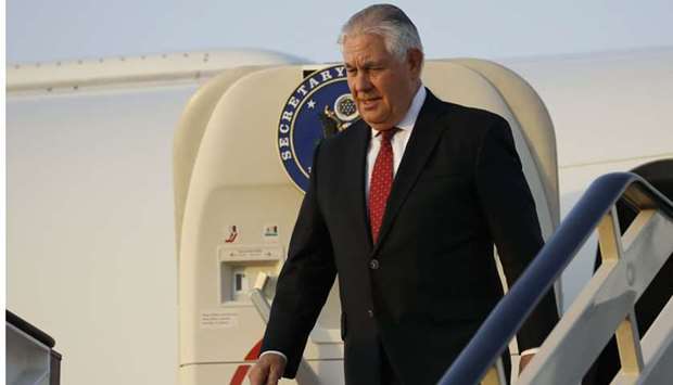 US Secretary of State Rex Tillerson steps off his plane as he arrives at King Salman Air Base