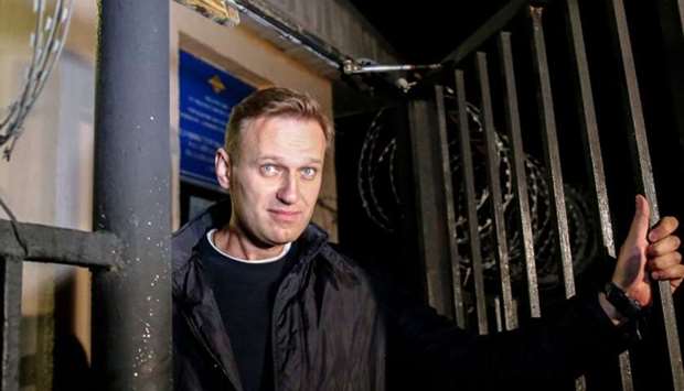 Russian opposition leader Alexei Navalny leaving a police station in Moscow.