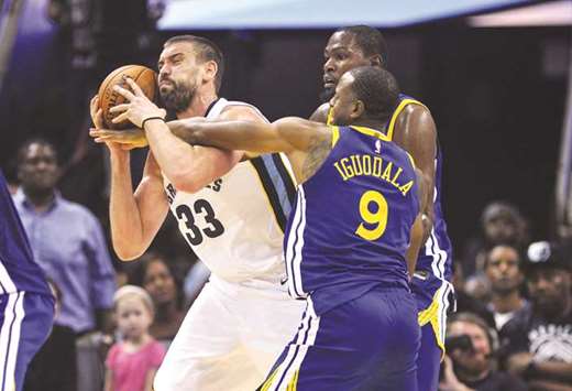 Memphis Grizzlies centre Marc Gasol (No 33) is fouled by Golden State Warriors forward Andre Iguodala during the second half of their NBA game. PICTURE: USA TODAY Sports)