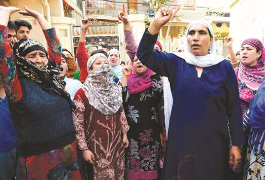 Women take part in a protest after a u2018braid choppingu2019 attack in the Batamaloo area of Srinagar. A wave of brutal, deadly panic has swept Kashmir after more than 100 women said they were victims of attackers who chopped off their hair.
