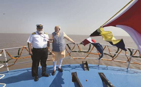 Prime Minister Narendra Modi takes a ride on the ferry to Dahej yesterday.