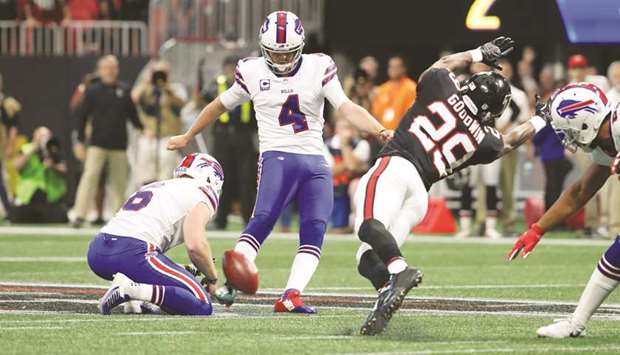 Buffalo Bills kicker Stephen Hauschka (second from left) kicks a field goal in the fourth quarter of the NFL game against the Atlanta Falcons at Mercedes-Benz Stadium in Atlanta, Georgia, on Sunday. (USA TODAY Sports)