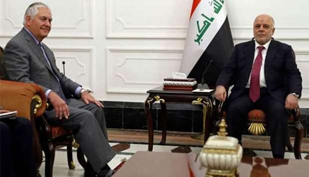 Secretary of State Rex Tillerson meets with Iraq's Prime Minister Haider al-Abadi in Baghdad on Monday.