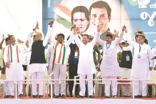 Congress vice president Rahul Gandhi stands on the stage with Other Backward Class (OBC) leader Alpesh Thakore during the u2018Navsarjan Gujarat Janadeshu2019 rally  in Gandhinagar, yesterday.