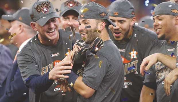 Houston Astros second baseman Jose Altuve smiles with the trophy after game seven of the 2017 ALCS playoff series against the New York Yankees. PICTURE: USA TODAY Sports