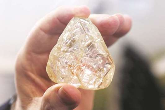 A 709-carat diamond, found in Sierra Leone and known as the u2018Peace Diamondu2019, being displayed during a tour ahead of its auction, at Israelu2019s Diamond Exchange, in Ramat Gan, Israel.