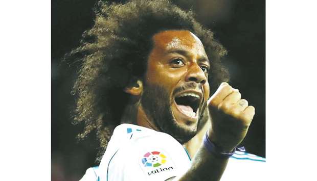 Real Madridu2019s Marcelo celebrates scoring their third goal against Eibar on Sunday.
