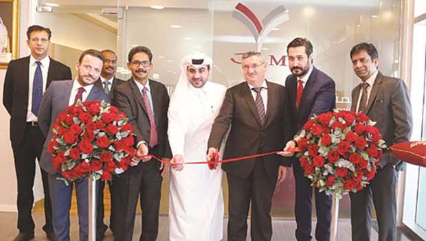 Turkish ambassador Fikret Ozer formally inaugurates the QLM Al Safa VIP lounge at the Turkish Hospital yesterday as Ahmad M Zebeib, senior manager u2014 Life & Medical, and other senior officials look on. PICTURE: Jayan Orma