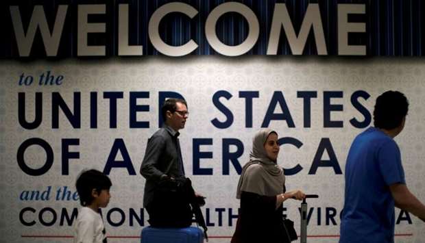 International passengers arrive at Washington Dulles International Airport after the US Supreme Court granted parts of the Trump administration's emergency request to put its travel ban into effect later in the week pending further judicial review, in Dulles, Virginia, US, June 26, 2017.