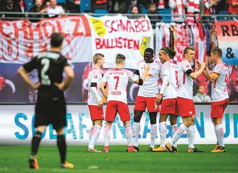 The Bundesliga clash on Saturday is also a mouth-watering prospect with just a point separating third-placed RB Leipzig and champions Bayern Munich, who are second. (AFP)