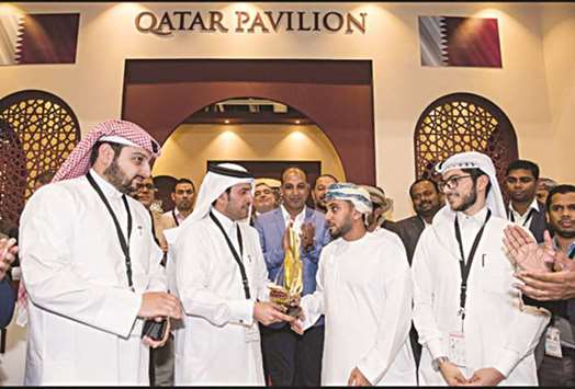 Qatari and Omani participants of u2018Infra Omanu2019 at the Qatari pavilion during the event.