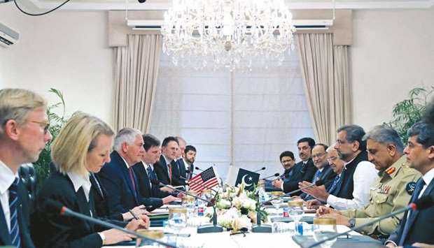 US Secretary of State Rex Tillerson sits across from Pakistani Prime Minister Shahid Khaqan Abbasi during their meeting at the Prime Ministeru2019s residence in Islamabad yesterday.