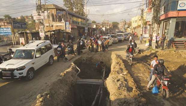 Kathmanduu2019s drivers must contend with chaotic roadworks.