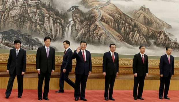 China's President Xi Jinping and other new Politburo Standing Committee members Wang Huning, Li Zhanshu, Han Zheng, Li Keqiang, Wang Yang, Zhao Leji