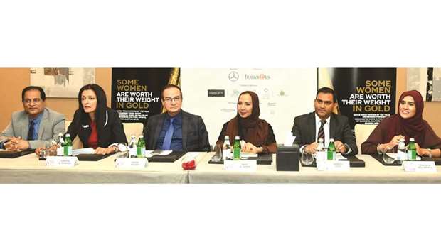 Amal al-Aathem (third right) and other officials at the press conference yesterday.