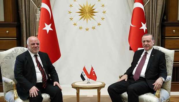 Turkish President Recep Tayyip Erdogan (R) meeting Iraqi Prime Minister Haider al-Abadi at the Presidential Complex in Ankara.