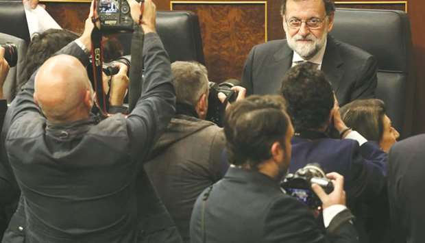 Spainu2019s Prime Minister Mariano Rajoy arrives for the weekly cabinet session at Parliament in Madrid.
