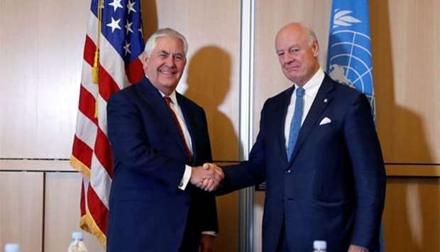 US Secretary of State Rex Tillerson shakes hands with UN Special Envoy for Syria Staffan de Mistura before their meeting at the US Mission to the UN in Geneva on Thursday.