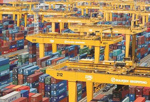Hanjin Shippingu2019s container terminal is seen at the Busan New Port. South Koreau2019s exports grew 6.1% in the third quarter after declining 2.9% a quarter earlier, while private consumption growth slowed to 0.7% in the July-September period from 1%.