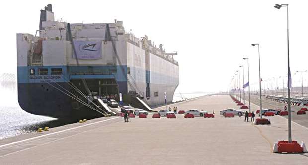 A ship unloads vehicles at the Hamad Port (file). Motorcars, turbojets and parts of aircraft and helicopters comprised the main components in Qataru2019s import basket in September.