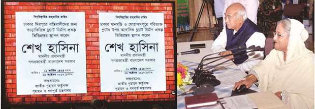 Prime Minister Sheikh Hasina opened two housing projects in Dhaka through videoconferencing yesterday as Housing and Public Works Minister Engineer Mosharraf Hossain looks on.