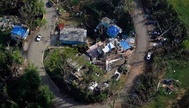 An aerial view of houses affected by the passing of Hurricane Maria in Naranjito, Puerto Rico