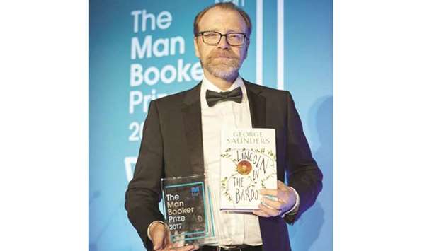 HONOUR: George Saunders with his prized possessions, the work and the award.
