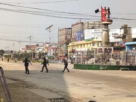 Police patrol the area after a clash erupted in Birtamod town of Nepal yesterday.