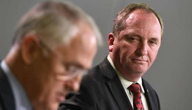 Australia's Deputy Prime Minister Barnaby Joyce (R) looking at Prime Minister Malcolm Turnbull addressing a press conference in Sydney. File photo: July 5, 2016