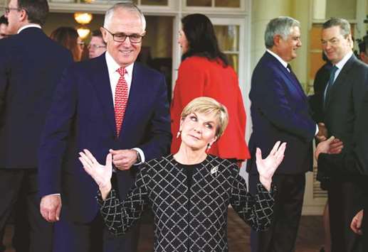 Australiau2019s Prime Minister Malcolm Turnbull looks on Foreign Minister Julie Bishop gestures at an event in Canberra.