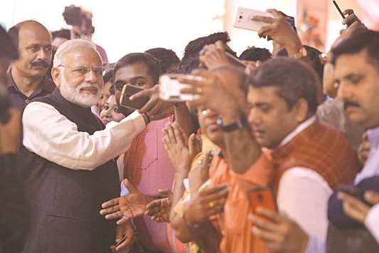 Journalists take a selfie with Prime Minister Narendra Modi during the Diwali Milan event in New Delhi yesterday.