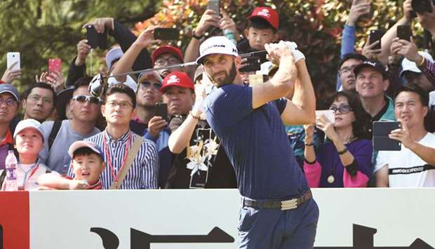Dustin Johnson tees off during the third round of the WGC-HSBC Champions in Shanghai yesterday. (AFP)