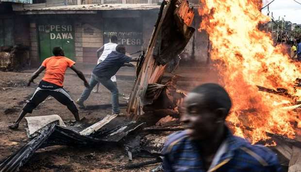 Residents of Kawangware district of Nairobi erect a burning barricade on October 27, 2017 during post electoral violence.