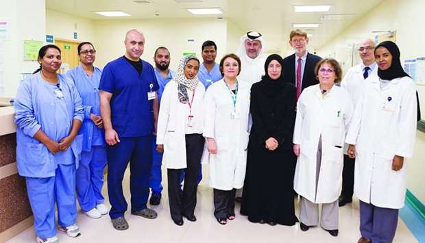 HE the Minister of Public Health Dr Hanan Mohamed al-Kuwari with the NCCCR team