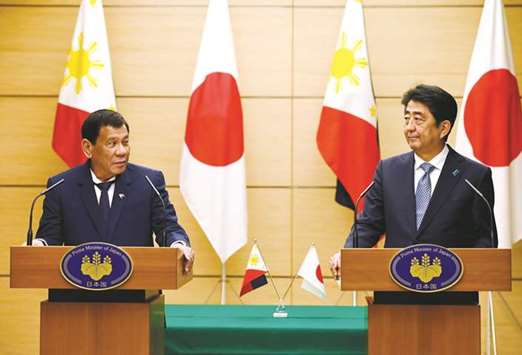 President Rodrigo Duterte delivers his speech beside Japanese Prime Minister Shinzo Abe during the joint remarks announcement at Abeu2019s official residence in Tokyo yesterday.