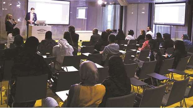 Experts from QNL and Hamad Bin Khalifa University Press share their insights at a workshop.