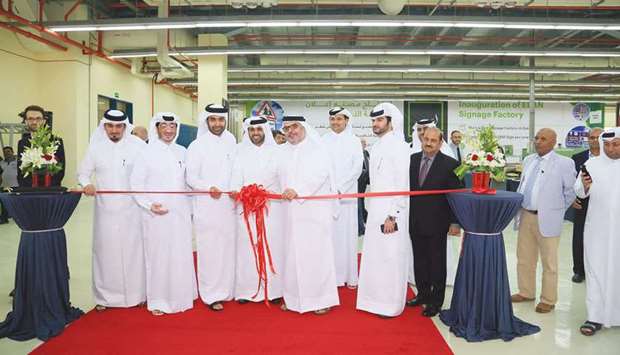 Ashghal president Saad bin Ahmed bin Ibrahim al-Mohannadi, Elan Group chairman and Qatar Development Bank CEO Abdul Aziz bin Nasser al-Khalifa, Elan Group CEO Jaber Abdullah al-Ansari and other officials at the opening of Elan Signage Factory yesterday.