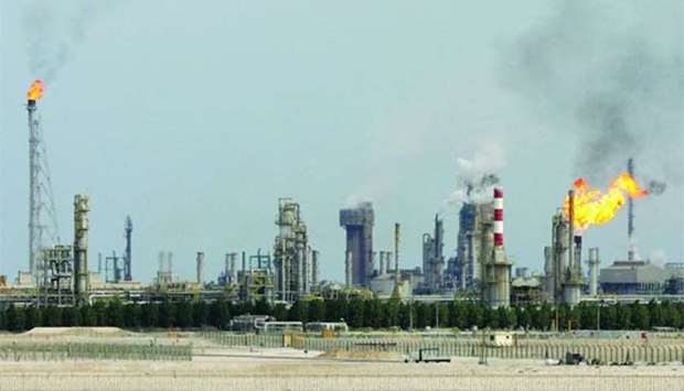 An oil refinery is pictured on the outskirts of Doha. The Qatari economy and financial markets are weathering the blockade after the initial shock of the June 5 measures, IMF said.