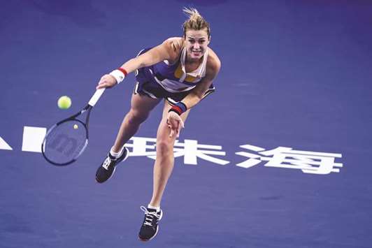 Russiau2019s Anastasia Pavlyuchenkova serves en route to her win over Angelique Kerber of Germany in Zhuhai, in south Chinau2019s Guangdong province yesterday. (AFP)