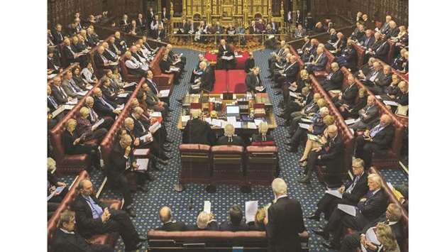 The House of Lords chamber sits in session at the Houses of Parliament in London yesterday.