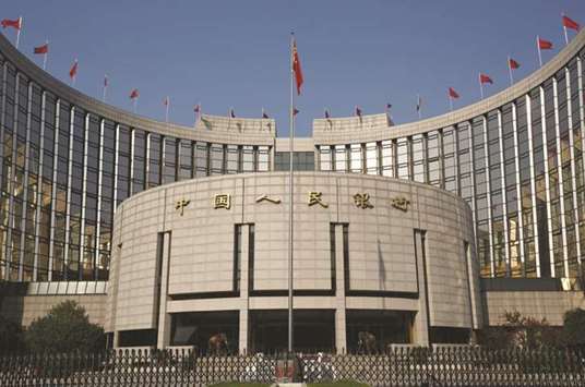 The Peopleu2019s Bank of China headquarters in Beijing. The PBoC tried to calm a nervous bond market yesterday with more liquidity injections, helping to steady 10-year yields following a sell-off, as anxiety deepened about a renewed crackdown on riskier lending even as the economy showed signs of slowing.