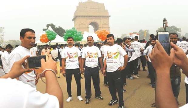 u2018Run for Unityu2019 participants get their photographs taken in front of the landmark India Gate in New Delhi yesterday. Prime Minister Narendra Modi flagged off the Run for Unity event in in New Delhi to mark the birth anniversary of Indiau2019s first deputy prime minister and home minister Sardar Vallabhbhai Patel.