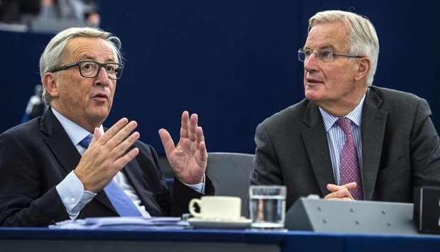 European Commission President Jean-Claude Juncker (L) and European Chief Negotiator for Brexit Michel Barnier