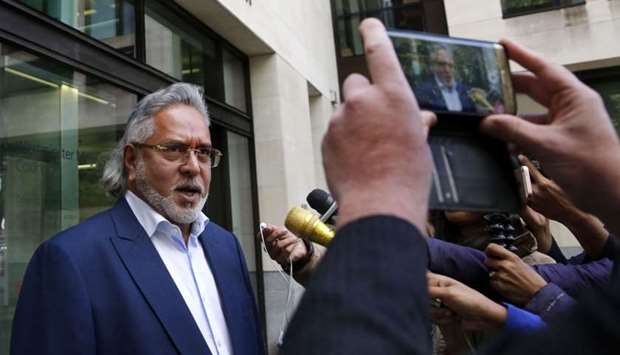Indian tycoon Vijay Mallya leaves Westminster Magistrates' Court in central London on October 3, 2017