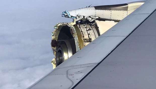 This photo obtained on the twitter account of @Bdaddy1391 and taken on September 30, 2017 shows the damaged engine of an Air France A380 superjumbo while onboard before it made an emergency landing in Canada.