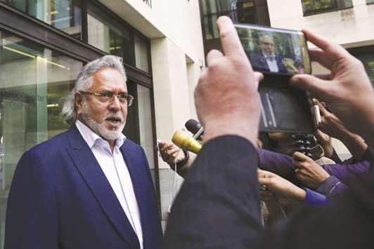 Vijay Mallya leaves Westminster Magistratesu2019 Court in central London yesterday. British police rearrested Mallya yesterday amid an ongoing extradition request from India.